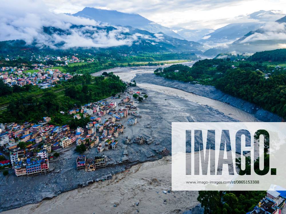An aerial view shows the aftermath of severe flooding along the Bhotekoshi River in Nuwakot, Nepal. The flooding affected low-lying areas and settlements near the riverbanks, causing widespread damage to homes, roads, bridges, a hydropower station and other infrastructure. Several people remain missing as authorities continue to assess the extent of the disaster. Rescue teams and security personnel are conducting search and rescue operations in the affected areas. Nuwakot Nepal - ZUMAq101 20260828_zna_q101_127
