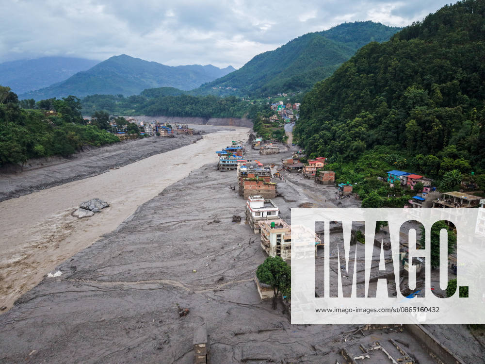 Nepal-China flash flood death toll rises, hundreds remain missing NUWAKOT, NEPAL - AUGUST 28: An aerial view of destroyed houses and roads covered in muds along the Trishuli River, following landslide and flash floods in areas near the Nepal-China border, in Nuwakot, Nepal, on August 28, 2026. Death toll from the disaster has so far risen to more than 530, with hundreds of people missing, including foreign nationals from 32 countries such as China, Malaysia, South Korea, Australia, the United Kingdom, India and the United States. Daniel Ceng Anadolu Nuwakot Nepal. Editorial use only. Please get in touch for any other usage.