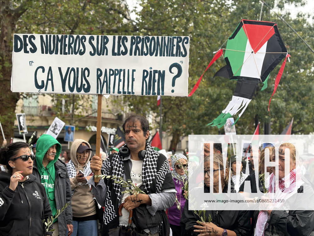 Pro-Palestinian demonstrators march through rain in Paris holding olive branches and kites PARIS, FRANCE - AUGUST 29: Demonstrators hold olive branches and kites while marching through heavy rain near Place de la Bastille in central Paris, France, on August 29, 2026. Gathering despite inclement weather, pro-Palestinian activists paraded toward the historic Fontaine des Innocents, displaying olive branches as symbols of peace and flying kites to draw international attention to the humanitarian crisis in Gaza while demanding an immediate ceasefire and the lifting of blockades. Esra Taskin Anadolu Paris France. Editorial use only. Please get in touch for any other usage.