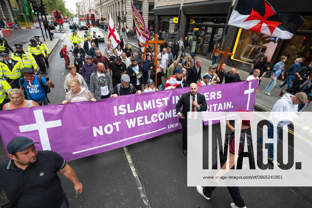 UKIP leader Nick Tenconi marches n the street during the No Sharia Law march. Supporters of the UK Independence Party (UKIP), led by party leader Nick Tenconi, took part in the No Sharia Law march from Hyde Park Corner to Downing Street in London. Demonstrators marched through the capital opposing the application of Sharia law in the United Kingdom, carrying banners expressing opposition to Islamic immigration to the UK. London United Kingdom - ZUMAs197 20260829_aaa_s197_129