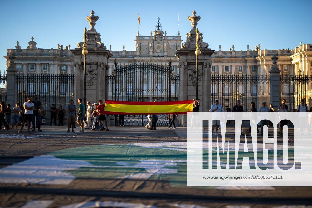 A Spanish flag is seen in front of the Royal Palace during a far-right rally in Madrid.Rally organized by far-right groups such as Europe Save Act, Revuelta, and Reconquista in support of remigration, under the slogan Save Spain, save Europe! Madrid Spain - ZUMAs197 20260829_aaa_s197_146