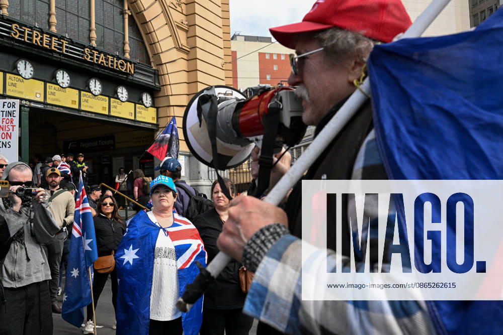 MARCH FOR AUSTRALIA RALLY MELBOURNE, People participate in a March for Australia anti-immigration rally outside the Flinders St Station in Melbourne, Sunday, August 30, 2026. ( NO ARCHIVING Melbourne Victoria AUSTRALIA