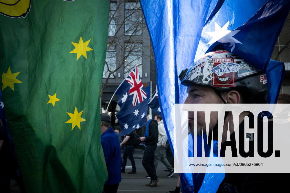 ANTI IMMIGRATION RALLY, Far right protestors march through the streets of Melbourne during a far right March for Australia anti-immigration rally in Melbourne, Sunday, August 30, 2026. ( NO ARCHIVING MELBOURNE VICTORIA AUSTRALIA