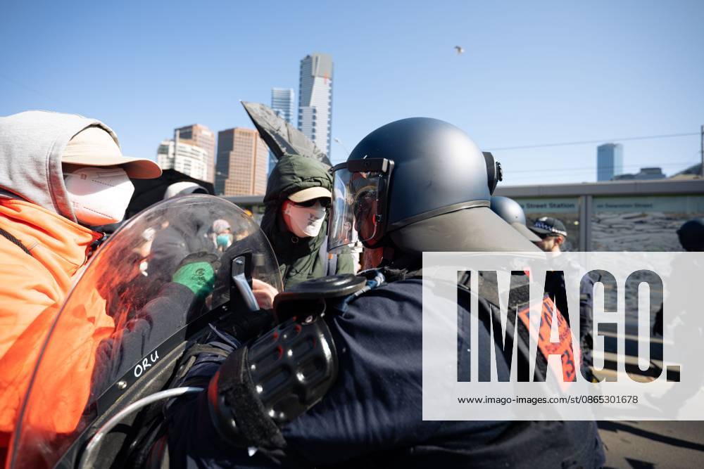 MELBOURNE, AUSTRALIA, AUGUST 30, 2026: Supporters of a demonstration previously promoted as Ã¢â‚¬oeMarch for AustraliaÃ¢â‚¬Â and later described by organizers as a Ã¢â‚¬oeFree SpeechÃ¢â‚¬Â protest gather in Melbourne during an event led by internet personality Hugo Lennon, known online as Ã¢â‚¬oeAuspill.Ã¢â‚¬Â Clashes break out involving protesters, counter-protesters and police, prompting officers to deploy crowd-control spray and pepper-ball rounds. Melbourne Australia - ZUMAq101 20260830_zna_q101_061
