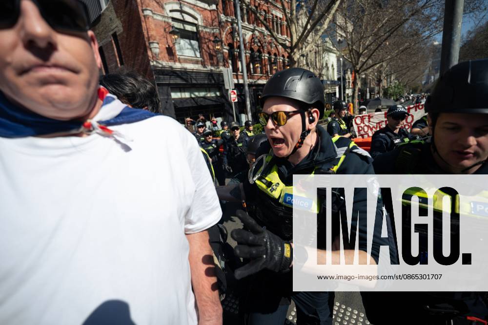 MELBOURNE, AUSTRALIA, AUGUST 30, 2026: Supporters of a demonstration previously promoted as â€oeMarch for Australia†and later described by organizers as a â€oeFree Speech†protest gather in Melbourne during an event led by internet personality Hugo Lennon, known online as â€oeAuspill.†Clashes break out involving protesters, counter-protesters and police, prompting officers to deploy crowd-control spray and pepper-ball rounds. Melbourne Australia - ZUMAq101 20260830_zna_q101_065