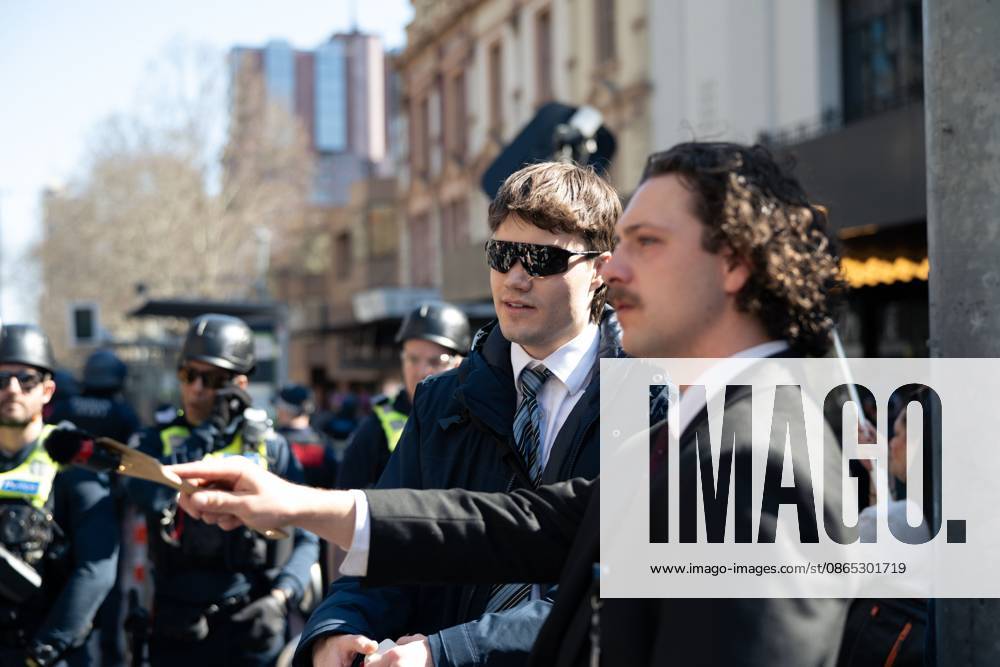 MELBOURNE, AUSTRALIA, AUGUST 30, 2026: Supporters of a demonstration previously promoted as â€oeMarch for Australia†and later described by organizers as a â€oeFree Speech†protest gather in Melbourne during an event led by internet personality Hugo Lennon, known online as â€oeAuspill.†Clashes break out involving protesters, counter-protesters and police, prompting officers to deploy crowd-control spray and pepper-ball rounds. Melbourne Australia - ZUMAq101 20260830_zna_q101_069
