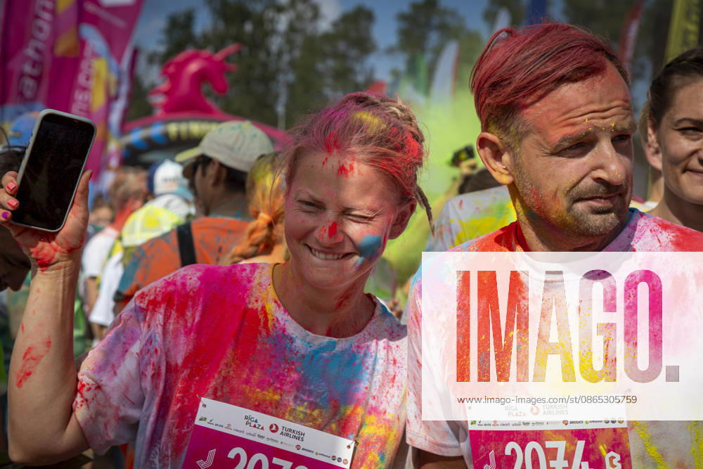 Jurmala, Latvija: People take part in the Color Run in Jurmala, Latvia, Aug. 30, 2026. The 5 km race was held in Jurmala. Jurmala Latvija - ZUMAp305 20260830_zip_p305_001