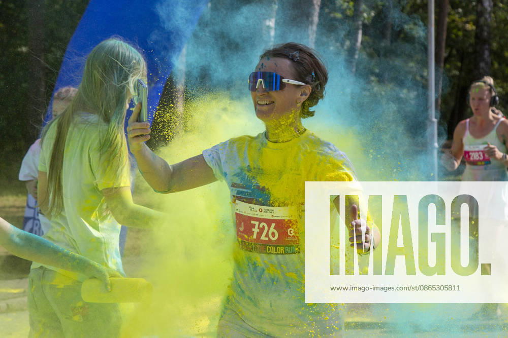 Jurmala, Latvija: People take part in the Color Run in Jurmala, Latvia, Aug. 30, 2026. The 5 km race was held in Jurmala. Jurmala Latvija - ZUMAp305 20260830_zip_p305_010