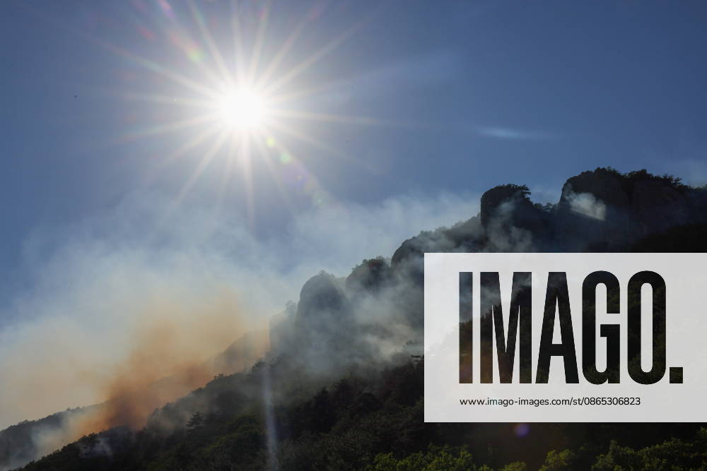 RUSSIA, REPUBLIC OF CRIMEA - AUGUST 30, 2026: Smoke billows from a burning forest on Chishma-Kaya Rocks in the vicinity of Mangul-Kale in the Bakhchisarai District. Maxim Churusov TASS 96853178