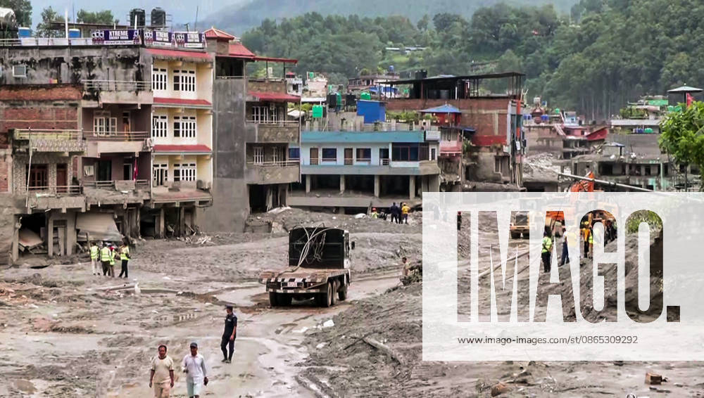 Heavy Machinery Clears Mud and Debris from Flood-Damaged Residential Area in Nuwakot Nuwakot Nepal , Aug 30 (ANI): Heavy machinery, including excavators and trucks, clears thick mud and debris from a residential area damaged by a devastating flood, as workers assess the site amid ongoing cleanup operations at Trishuli, in Nuwakot on Sunday. (ANI Video Grab) Nuwakot Nepal