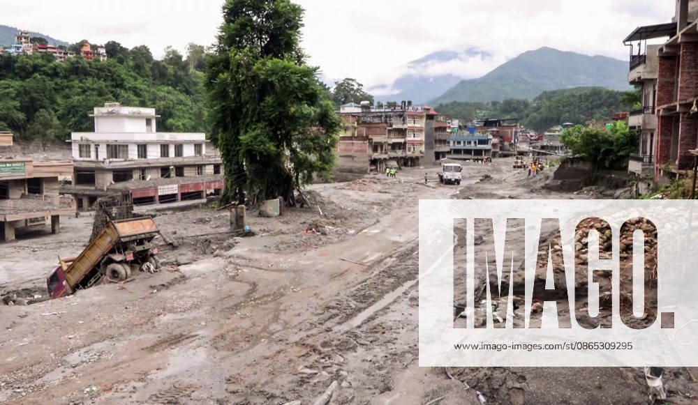 Flood Leaves Mud-Covered Streets and Overturned Truck in Nuwakot Nuwakot Nepal , Aug 30 (ANI): A mud-covered street lined with buildings shows the aftermath of a devastating flood, with an overturned truck and ongoing debris clearance efforts visible in the area at Trishuli, in Nuwakot on Sunday. (ANI Video Grab) Nuwakot Nepal