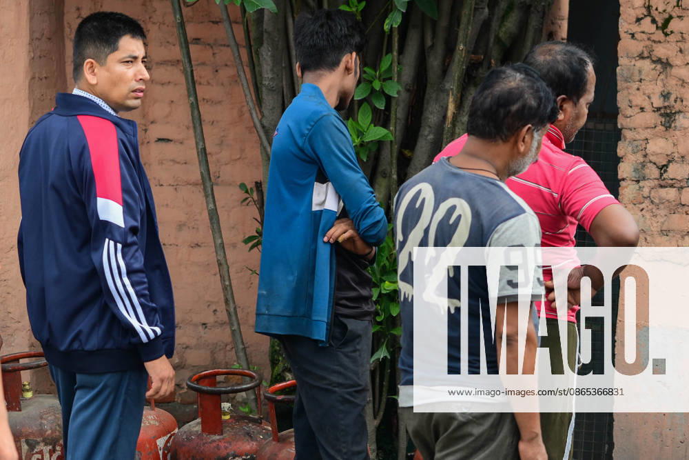 Customers wait in long queues to receive liquefied petroleum gas (LPG) cylinders in Kathmandu, Nepal, on August 31, 2026, as the devastating Rasuwa floods add further pressure to an already strained cooking gas distribution system. Nepal had already been facing long queues and difficulties obtaining LPG, with increased demand and distribution problems affecting consumers. The catastrophic flash floods that struck near the Nepal-China border on August 26 swept away homes, vehicles, roads, bridges and other infrastructure, while LPG cylinders were also carried away by the powerful floodwaters. Some people were seen entering the floodwaters and swimming to retrieve the cylinders. The disaster disrupt - ZUMAs330 20260831_zsp_s330_002