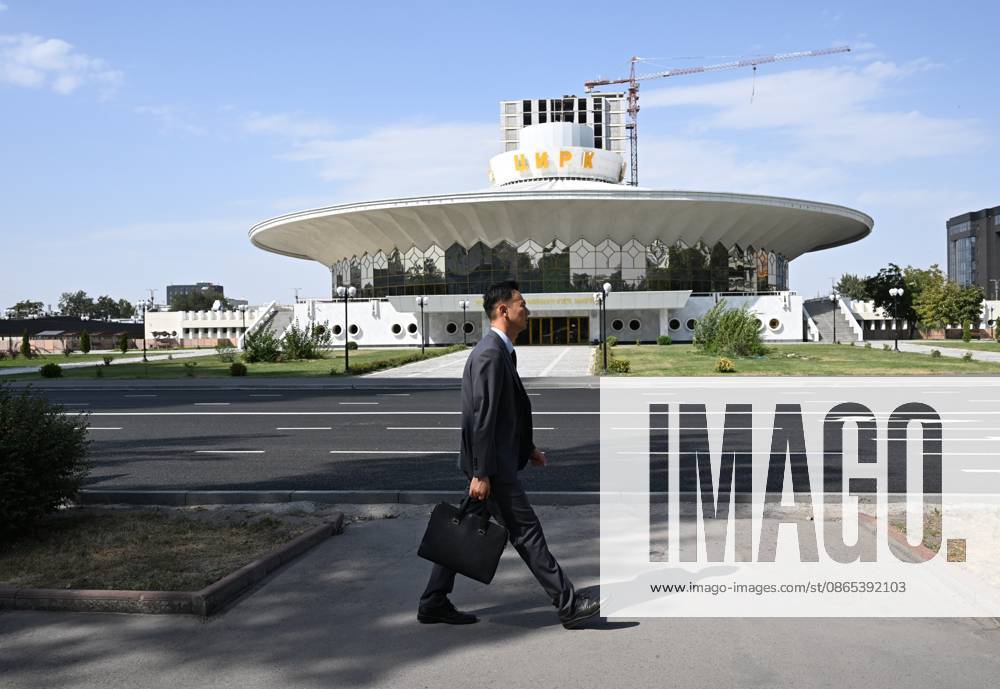 Kyrgyzstan SCO Summit Preparations 9231726 31.08.2026 A man walks past the Kyrgyz State Circus in Bishkek, Kyrgyzstan. The Shanghai Cooperation Organization (SCO) summit will be held in the Kyrgyz capital from August 31 to September 1. Kristina Solovyova Sputnik Bishkek Kyrgyzstan