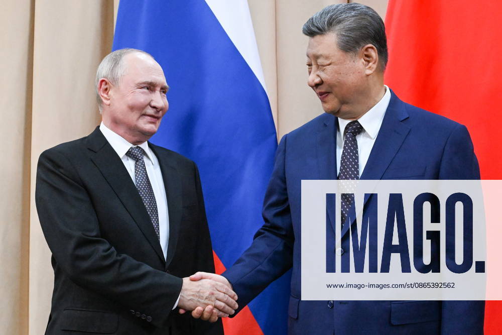 KYRGYZSTAN, BISHKEK - AUGUST 31, 2026: Russia’s President Vladimir Putin (L) and China s President Xi Jinping shake hands during a meeting at the Hyatt Regency Bishkek Hotel ahead of the 2026 SCO Summit. Konstantin Zavrazhin POOL TASS 96904250