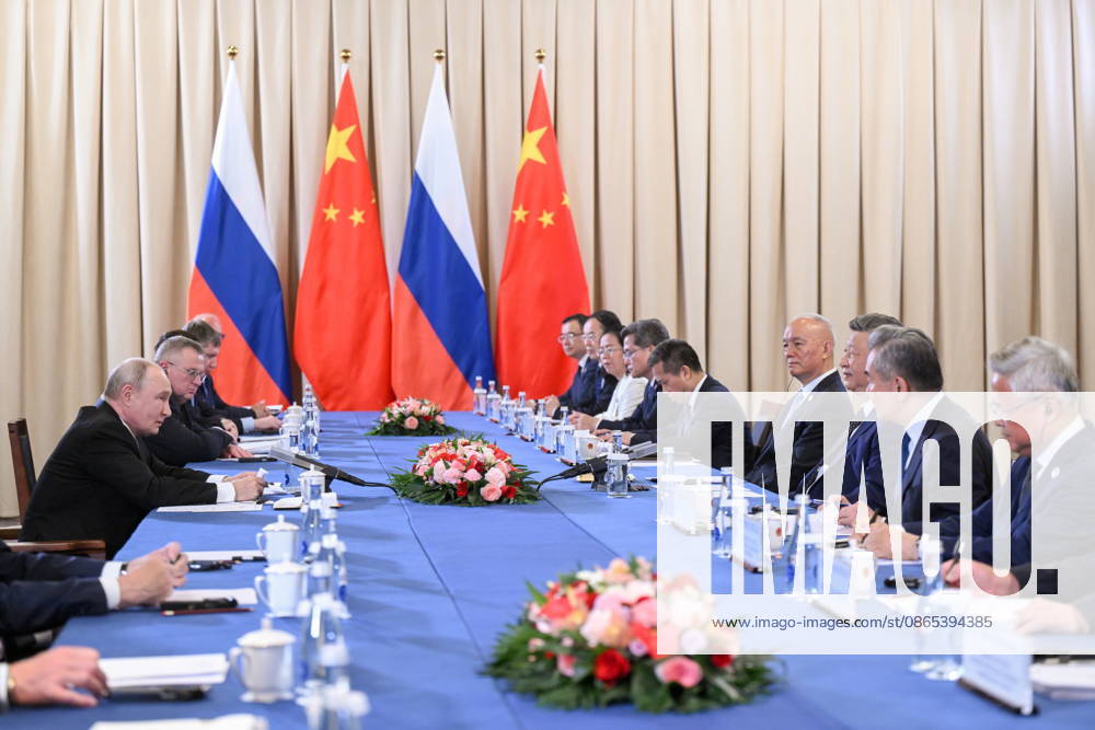KYRGYZSTAN, BISHKEK - AUGUST 31, 2026: Russia’s President Vladimir Putin (L) and China s President Xi Jinping (3rd R) are seen during a meeting at the Hyatt Regency Bishkek Hotel on the sidelines of the 2026 SCO Summit. Kristina Solovyova POOL TASS 96904943