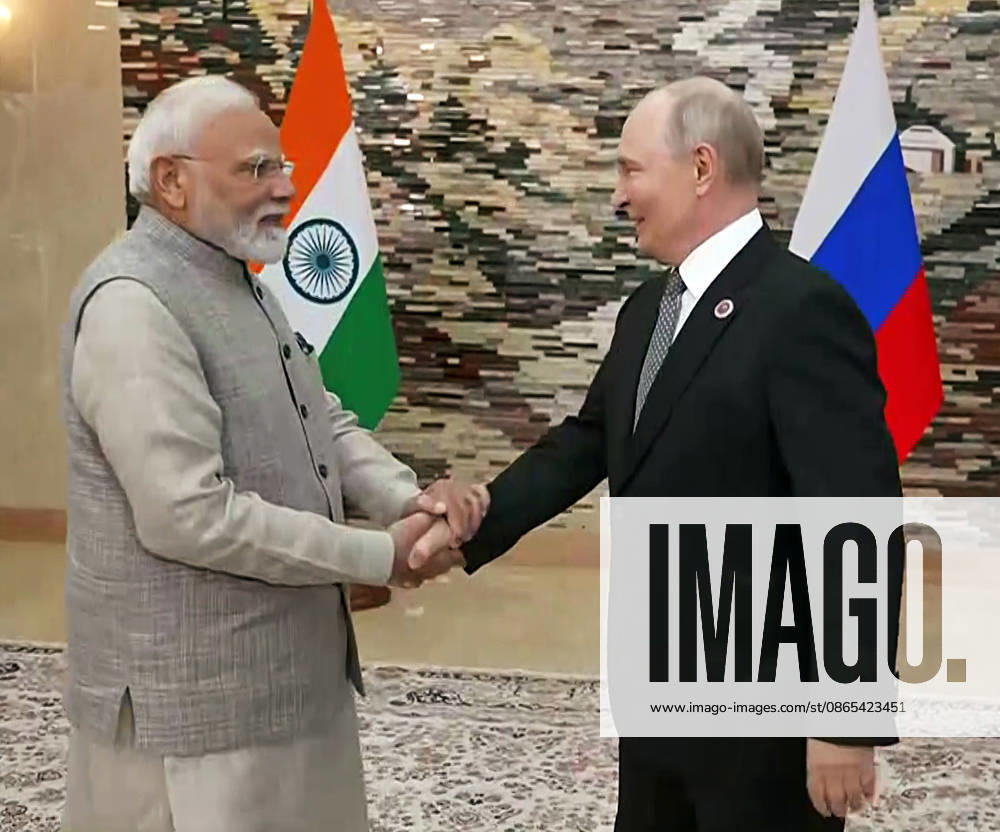 Bilateral Talks Between PM Modi & President Vladimir Putin Bishkek Kyrgyzstan , Aug 31 (ANI): Prime Minister Narendra Modi and Russian President Vladimir Putin exchange a handshake ahead of their bilateral talks on the sidelines of the Shanghai Cooperation Organization (SCO) summit, in Bishkek on Monday. (DD ANI Video Grab) Bishkek Kyrgyzstan