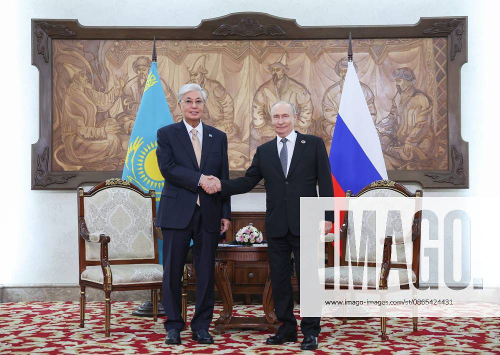 Kyrgyzstan Putin SCO Summit 9231967 31.08.2026 Kazakh President Kassym-Jomart Tokayev and Russian President Vladimir Putin shake hands as they pose for photos before a meeting on the sidelines of the Shanghai Cooperation Organization (SCO) summit in Bishkek, Kyrgyzstan. Petr Kovalev Sputnik Bishkek Kyrgyzstan