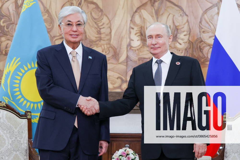 KYRGYZSTAN, BISHKEK - AUGUST 31, 2026: Kassym-Jomart Tokayev (L), President of Kazakhstan, and his counterpart Vladimir Putin of Russia shake hands during a meeting on the sidelines of the 2026 SCO Summit. Peter Kovalev TASS 96913922