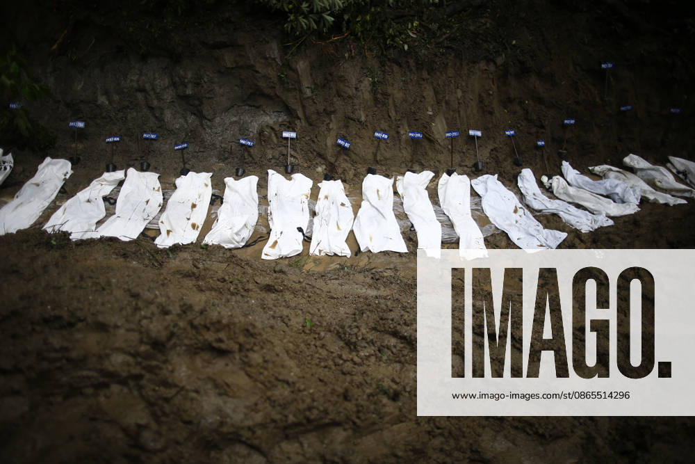 Bodies of unidentified flood victims are pictured at a temporary burial site at Gokarna in Kathmandu, Nepal, on Tuesday, September 1, 2026. Authorities have begun temporarily burying unidentified remains recovered from the devastating floods. DNA samples, photographs, and other identifying information are being collected before burial so families can later identify and reclaim the remains for final rites. The disaster has killed more than 1,000 people in Nepal, with thousands still missing. Kathmandu Nepal - ZUMAg200 20270901_zap_g200_005