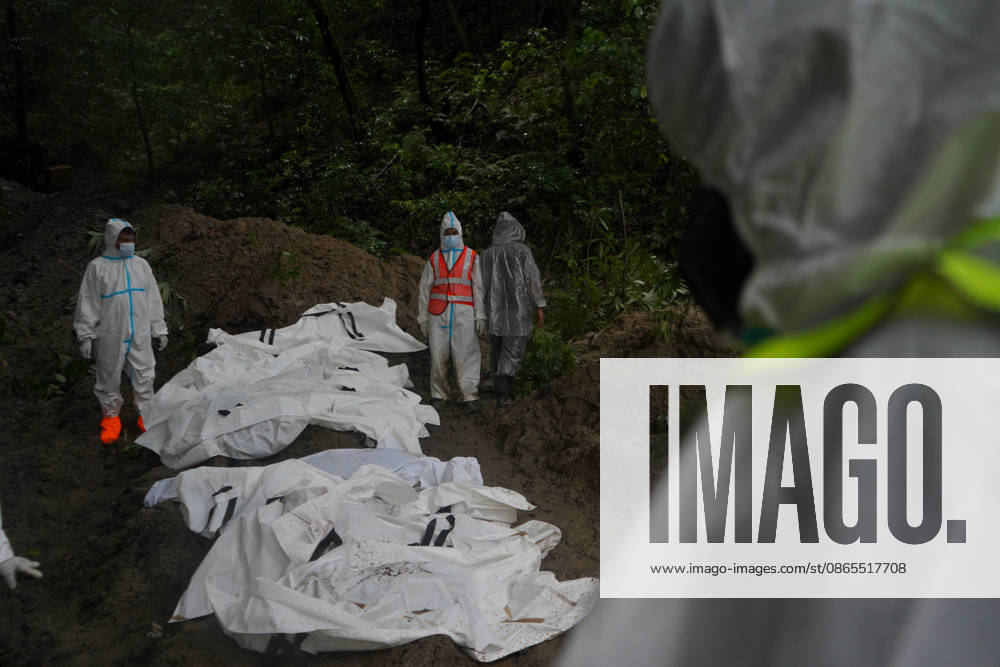 Nepali police personnel bury the bodies of flash-flood victims in a jungle in Gokarna, Kathmandu, Nepal, on September 1, 2026. Kathmandu Nepal - ZUMAd164 20260901_zip_d164_030