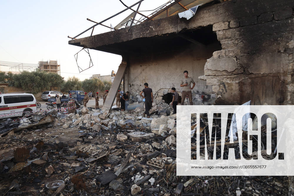 Binnish Syria Ammunition Explosion People inspect a damaged building and debris at the site of an explosion in Binnish, Idlib Governorate, Syria, on September 1, 2026. Five people were killed and several others injured when a vehicle loaded with ammunition exploded in Binnish, according to Syrian authorities, while the cause remained unclear and emergency crews worked to secure scattered munitions and prevent further explosions. Binnish Idlib Syria