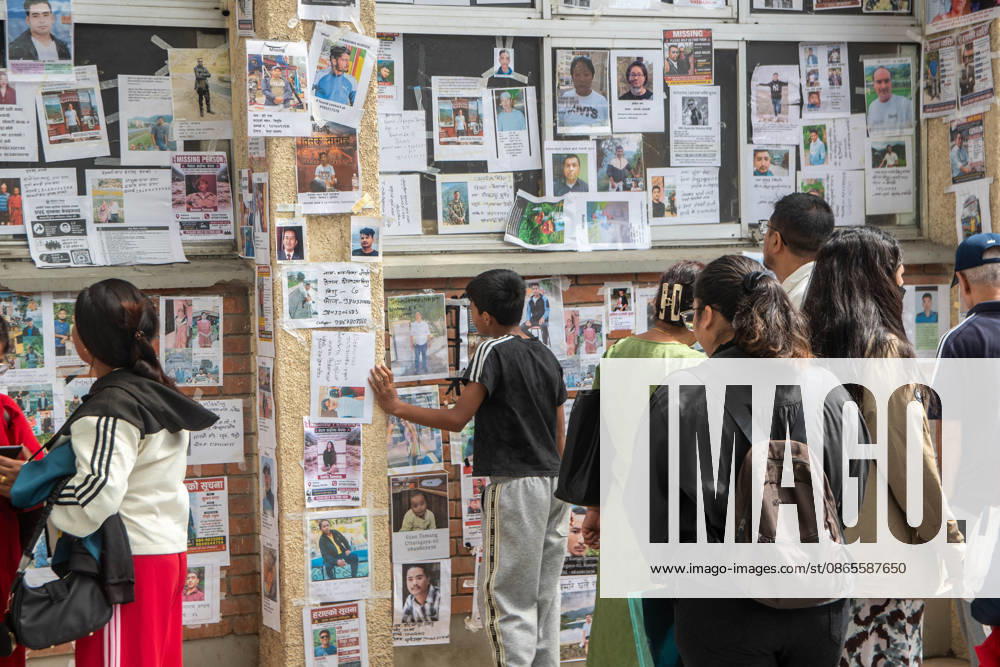 Relatives of missing persons inspect notice boards displayed with photos and details at Tribhuvan University Teaching Hospital in Kathmandu. Hundreds remain unaccounted for following severe flash floods caused by a glacial outburst along the Tibet-Nepal border on August 26. Kathmandu Nepal - ZUMAs197 20260901_aaa_s197_201