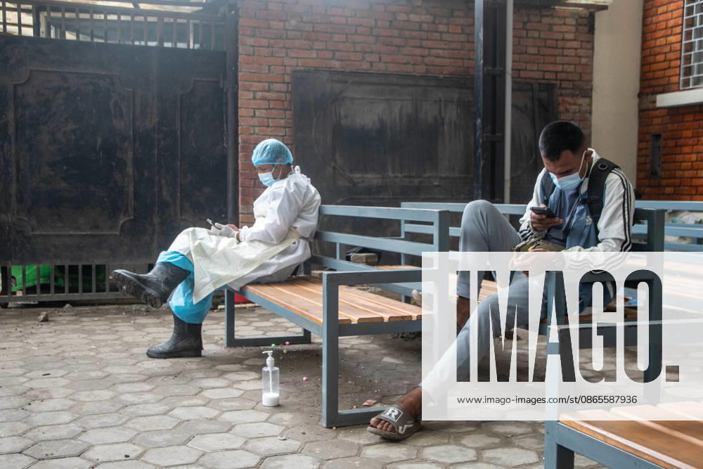 Personnel from the Nepal Police Disaster Management Office (DMO) wearing protective suits stand guard and manage victim identification lists at Tribhuvan University Teaching Hospital in Kathmandu. Authorities continue to verify identities of those affected by the catastrophic flooding along the Nepal-Tibet border. Kathmandu Nepal - ZUMAs197 20260901_aaa_s197_213