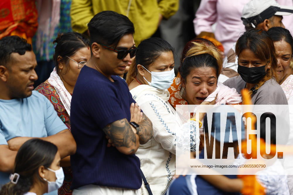 Ayusha Timilsina, 27, mourns the death of her husband, Suraj Timilsina, 32, while cremating a symbolic effigy made of straw and barley grains after his body could not be recovered following the devastating floods, at Pashupatinath Temple in Kathmandu, Nepal, on Wednesday, September 2, 2026. Suraj, originally from Sindhupalchok, was involved in an import-export and transport business in Timure, Rasuwa, and was swept away by the floods. He is survived by his wife and their six-year-old son and three-year-old daughter. As thousands remain missing and many bodies have yet to be recovered, families have begun performing final rites for loved ones without their remains. The floods have killed more than 1,000- ZUMAg200 20260902_zap_g200_006