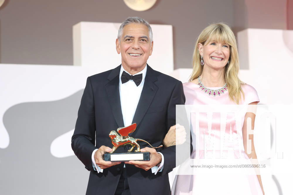 George Clooney and Laura Dern pose with the George Clooney Golden Lion For Lifetime Achievement during the 83rd Venice International Film Festival at Palazzo del Cinema on the Lido in Venice, Italy, on 02 September 2026. Photo: Venice Italy - ZUMAm179 20260902_zep_m179_039