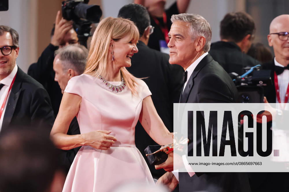 IPA88047862 - Venice, 83rd Venice International Film Festival The red carpet at the opening ceremony and the presentation of the Golden Lion for Lifetime Achievement during the 83rd Venice International Film Festival at the Palazzo del Cinema. Pictured: George Clooney, Laura Dern