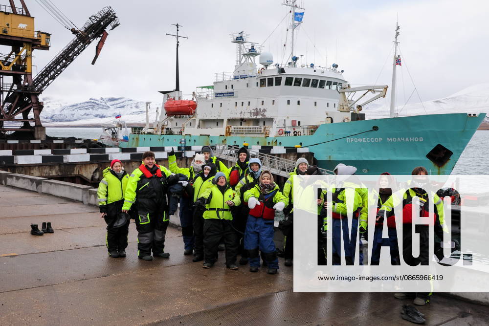 Participants of the Arctic Biennale research and art expedition are seen near the Professor Molchanov research vessel moored in the Port of Barentsburg on the Spitsbergen Archipelago. Sergei Malgavko TASS 97132036
