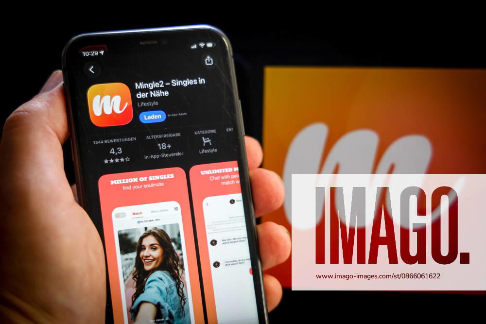 Apple App Store auf einem iPhone. Essenzielle Dating Apps. Mingle2 - Singles in der Nähe. Das iPhone wird in der Hand gehalten.. 06.09.2026