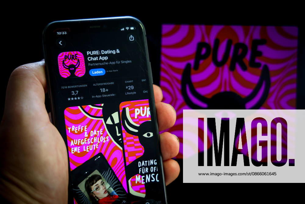 Apple App Store auf einem iPhone. Essenzielle Dating Apps. Pure: Dating & Chat App. Das iPhone wird in der Hand gehalten.. 06.09.2026
