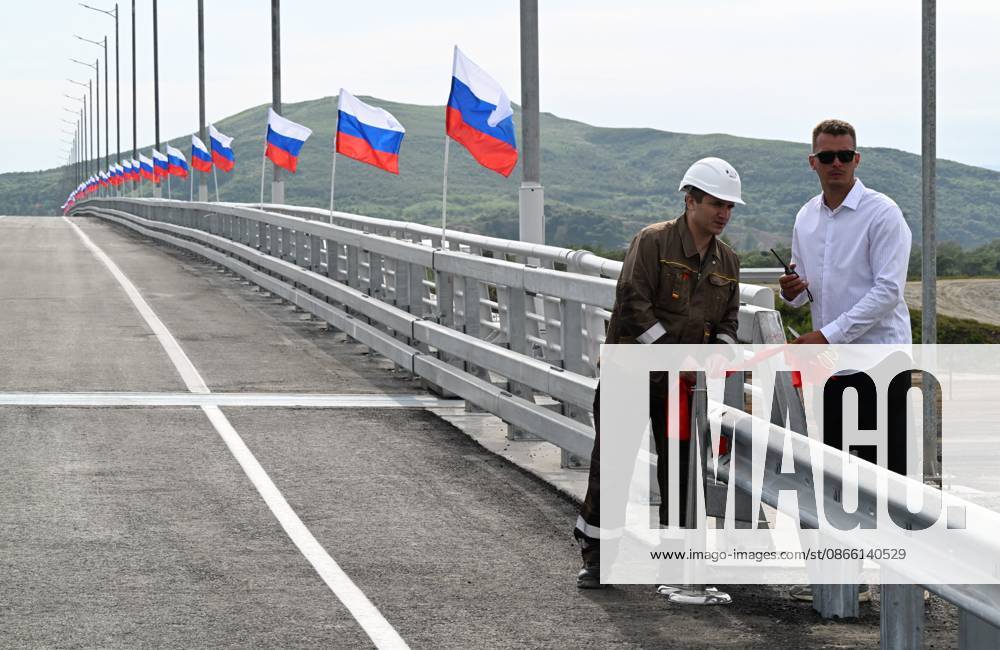 Russia North Korea Road Bridge 9237992 07.09.2026 Employees prepare for the ceremony to open the new road bridge over the Tumen River, connecting Russia s Primorye Territory and North Korea. The bridge is named after Yakov Novichenko, a Red Army officer who, in 1946, covered a grenade thrown at North Korean leader Kim Il Sung with his body. Vitaliy Ankov Sputnik Vladivostok Primorye Territory Russia