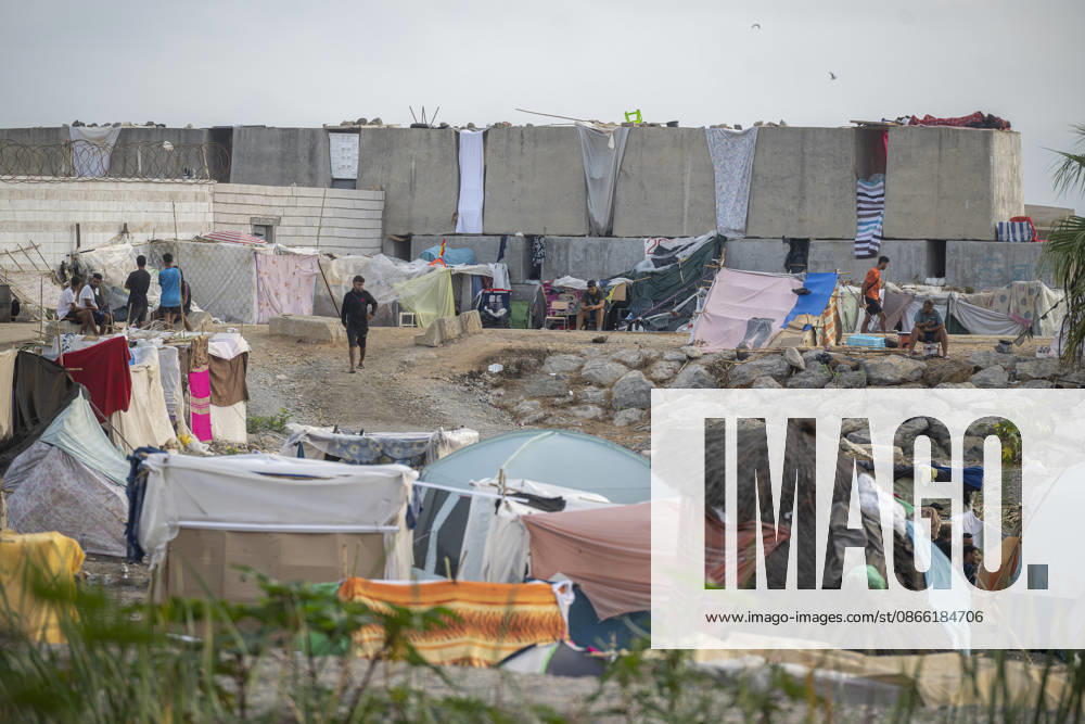 Settlements Continue on El Trampolín Beach Settlements on El Trampolín Beach, as of September 7, 2026, in Ceuta, Spain. Despite having been evicted, the encampment on El Trampolín Beach resembles a makeshift city and remains occupied by people who continue to arrive in Ceuta. SEPTEMBER 7, 2026 Ceuta, Spain