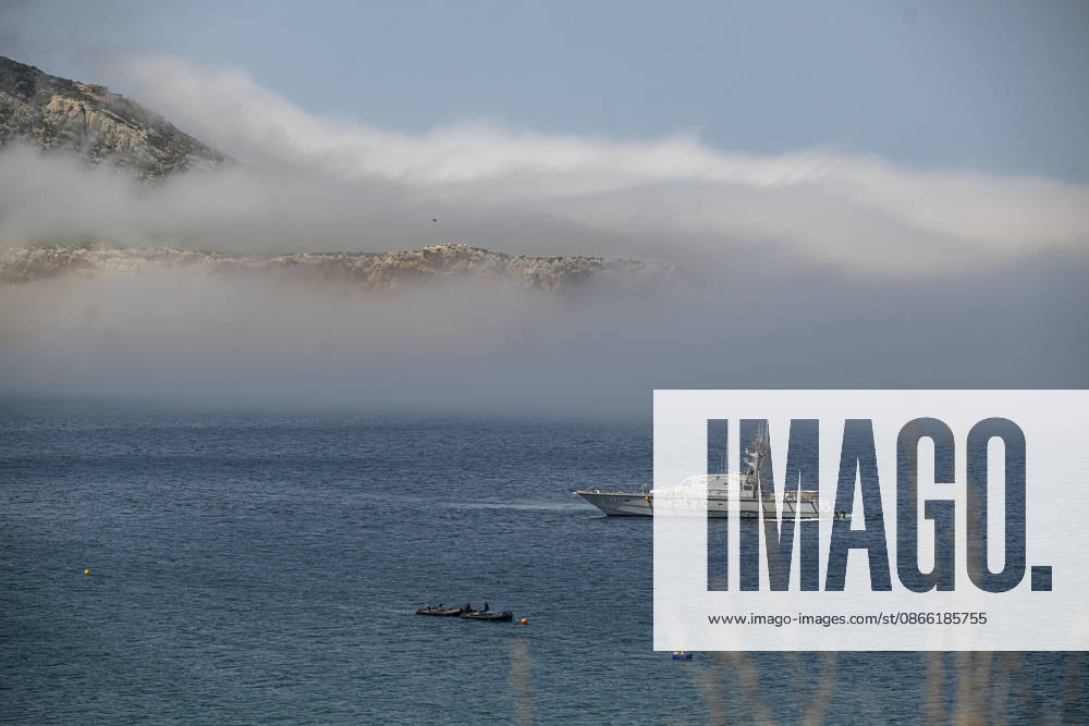 Settlements Continue on El Trampolín Beach: View of several small boats and a ship, September 7, 2026, in Ceuta, Spain. Despite having been cleared, the camp on El Trampolín Beach resembles a makeshift city and remains occupied by people who continue to arrive in Ceuta. SEPTEMBER 7, 2026 Ceuta, Spain