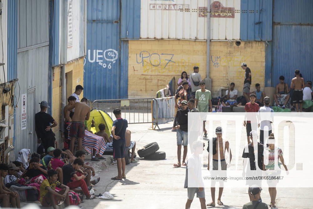Migration Situation in the Tarajal Warehouses in Ceuta: Migrants living in one of the Tarajal warehouses, as of September 7, 2026, in Ceuta, Spain. The government has taken control of the port of Ceuta to provide humanitarian assistance to migrants in tents and other spaces. Specifically, the department led by Óscar Puente authorizes the Secretary of State for Migration to temporarily use an area of 16,000 square meters of public port land. SEPTEMBER 7, 2026 Ceuta, Spain
