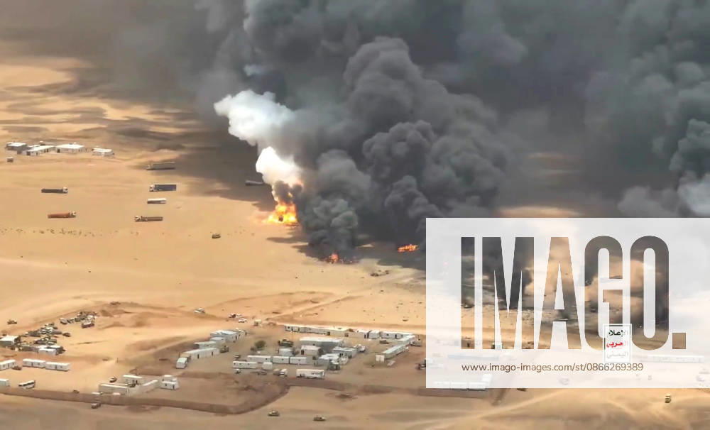 (260908) -- HADRAMOUT, Sept. 8, 2026 -- A screenshot shows trucks burning after they were targeted by ballistic missiles launched by Houthi group near Al-Wadiah military camp in Hadramout province, Yemen on Sept. 7, 2026. Yemen s Houthi group said Monday that it had carried out a ballistic missile strike on trucks it claimed were transporting military equipment from Saudi Arabia to the Al-Wadiah military camp in Yemen s government-controlled southeastern province of Hadramout. (Houthi Media Center Handout via Xinhua) YEMEN-HADRAMOUT-HOUTHI GROUP-MILITARY TRUCKS-ATTACK Mohammed