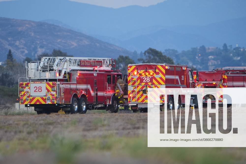 Firefighters from San Diego Fire-Rescue respond to the scene after the plane crashes at the runway..A small plane crashes and catches fire on the runway at Montgomery-Gibbs Executive Airport in Kearny Mesa of San Diego. Two people are killed in the crash, which is reported at about 5:20 p.m., according to San Diego police and fire-rescue officials. The Federal Aviation Administration temporarily close the airport as crews work at the scene and investigators begin determining the cause of the crash. San Diego United States - ZUMAs197 20260907_aaa_s197_583