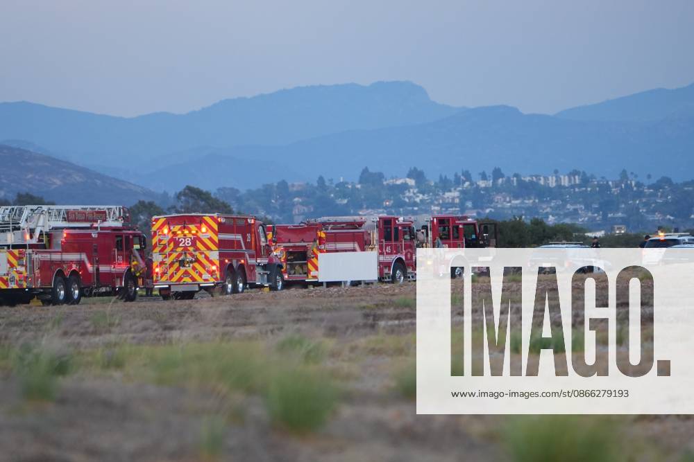 Firefighters from San Diego Fire-Rescue respond to the scene after the plane crashes at the runway..A small plane crashes and catches fire on the runway at Montgomery-Gibbs Executive Airport in Kearny Mesa of San Diego. Two people are killed in the crash, which is reported at about 5:20 p.m., according to San Diego police and fire-rescue officials. The Federal Aviation Administration temporarily close the airport as crews work at the scene and investigators begin determining the cause of the crash. San Diego United States - ZUMAs197 20260907_aaa_s197_592