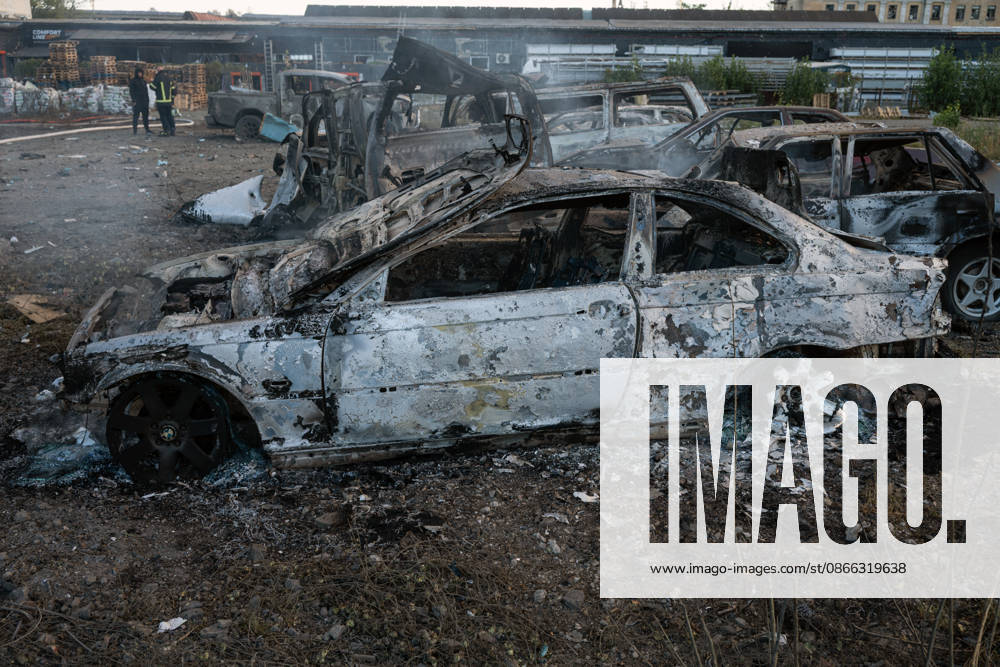 Cars that caught fire as a result of a Russian attack are in a parking lot in the Podilskyi district, Kyiv, Ukraine, September 8, 2026. On Tuesday night, September 8, Russian forces launched another massive strike on the Ukrainian capital with ballistic and cruise missiles, as well as jet UAVs. The attack caused significant damage to civilian infrastructure, residential areas, and business facilities. Three people were killed, and 19 were injured. (Photo by Danylo Antoniuk Ukrinform) Destruction and fires reported across Kyiv districts after Russian attack