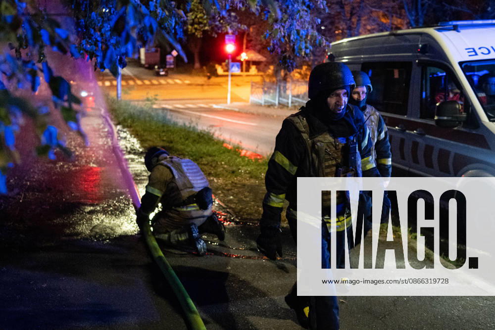 State Emergency Service rescue workers draw water from a hydrant as they respond to the consequences of a Russian attack, Kyiv, Ukraine, September 8, 2026. On Tuesday night, September 8, Russian forces launched another massive strike on the Ukrainian capital with ballistic and cruise missiles, as well as jet UAVs. The attack caused significant damage to civilian infrastructure, residential areas, and business facilities. Three people were killed, and 19 were injured. (Photo by Danylo Antoniuk Ukrinform) Destruction and fires reported across Kyiv districts after Russian attack