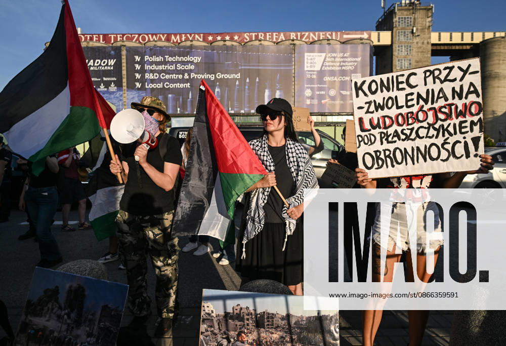 Anti-Israel Rally Outside Opening Day Of MSPO 2026 Defense Salon In Kielce KIELCE, POLAND - SEPTEMBER 8: Anti-Israel activists wave Palestinian flags, utilize a megaphone, and hold up a large hand-painted sign reading KONIEC PRZYZWOLENIA NA LUDOBOJSTWO POD PLASZCZYKIEM OBRONNOSCI! (End the permission for genocide under the guise of defense!) during a demonstration organized by the Expos Without Criminals ( Targi Bez Zbrodniarzy ) coalition outside the Targi Kielce exhibition center gates to demand the exclusion of Israeli weapons companies on the opening day of the 34th International Defence Industry Exhibition (MSPO) on September 8, 2026. Kielce Poland