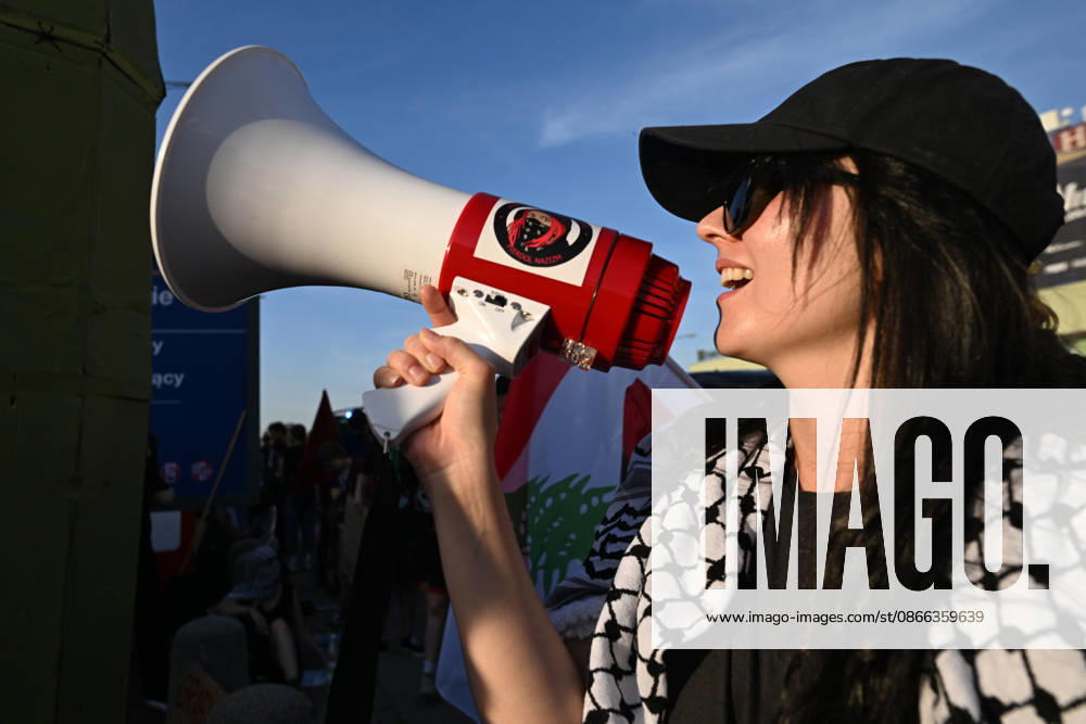 Anti-Israel Rally Outside Opening Day Of MSPO 2026 Defense Salon In Kielce KIELCE, POLAND - SEPTEMBER 8: An anti-Israel activist wearing a traditional keffiyeh and a black cap shouts slogans through a handheld megaphone during a demonstration organized by the Expos Without Criminals ( Targi Bez Zbrodniarzy ) coalition outside the Targi Kielce exhibition center gates to demand the exclusion of Israeli weapons companies on the opening day of the 34th International Defence Industry Exhibition (MSPO) on September 8, 2026. Kielce Poland