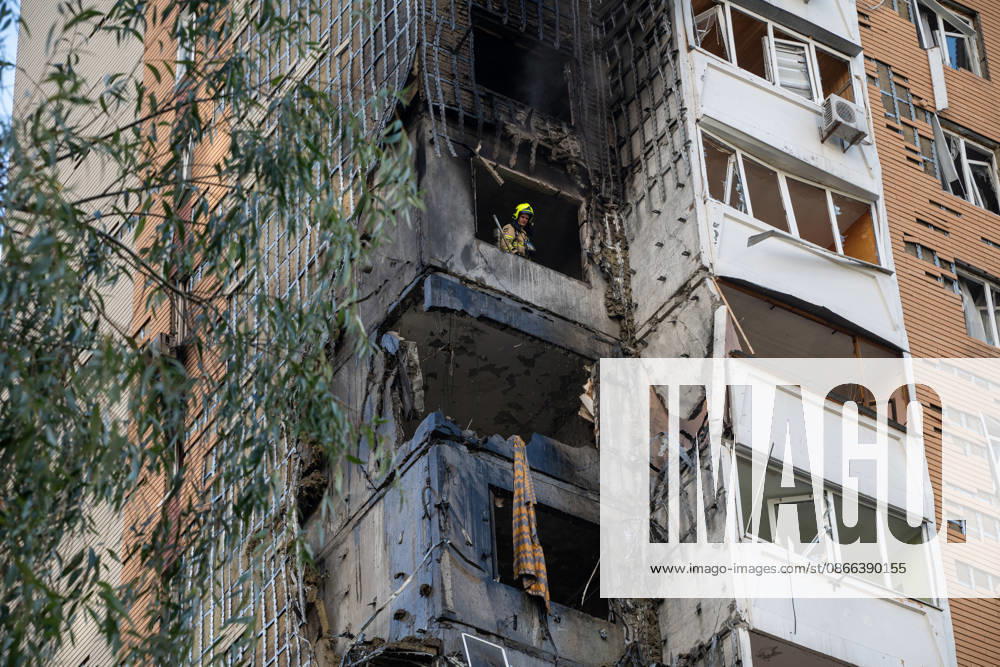 A State Emergency Service rescue worker looks out of a window in a 24-storey apartment block damaged by a Russian attack in the Darnytskyi district of Kyiv, Ukraine, September 9, 2026. On Wednesday morning, September 9, a Russian drone hit the 24-storey building on the 12th floor. According to police, five people were injured, including a pregnant woman. (Photo by Danylo Antoniuk Ukrinform) Apartment block hit by Russian drone in Kyiv