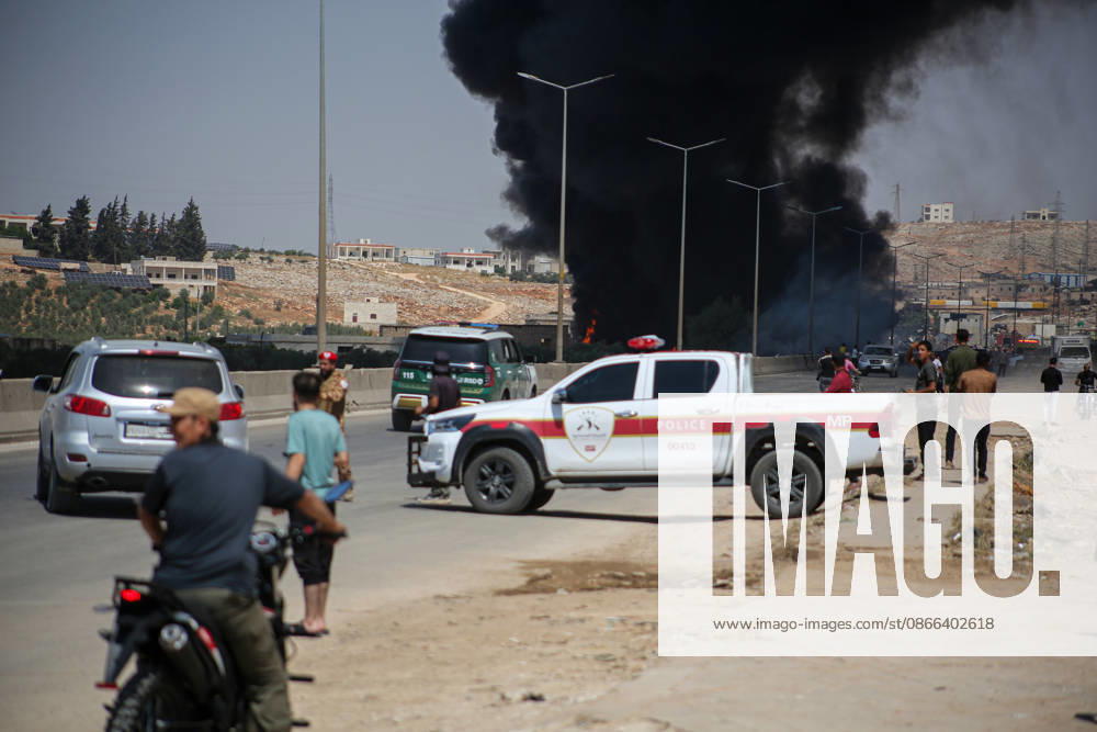 4 killed in explosion in Syria s Idlib province IDLIB, SYRIA - SEPTEMBER 09: Smoke rises after a powerful explosion, the cause of which has not yet been determined, at a warehouse where war remnant munitions were being collected near the Sarmada district of Idlib province in northwestern Syria on September 09, 2026. Police, ambulance, firefighting, and civil defense teams were dispatched to the area. Kasim Yusuf Anadolu Idlib Syria. Editorial use only. Please get in touch for any other usage.
