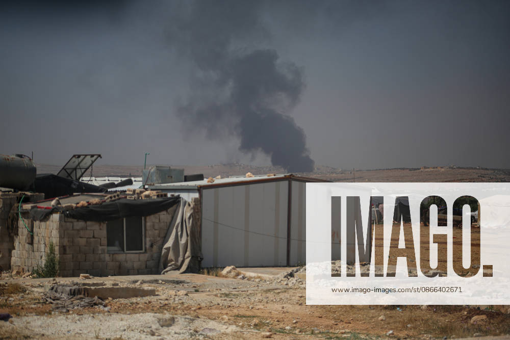 4 killed in explosion in Syria s Idlib province IDLIB, SYRIA - SEPTEMBER 09: Smoke rises after a powerful explosion, the cause of which has not yet been determined, at a warehouse where war remnant munitions were being collected near the Sarmada district of Idlib province in northwestern Syria on September 09, 2026. Police, ambulance, firefighting, and civil defense teams were dispatched to the area. Kasim Yusuf Anadolu Idlib Syria. Editorial use only. Please get in touch for any other usage.