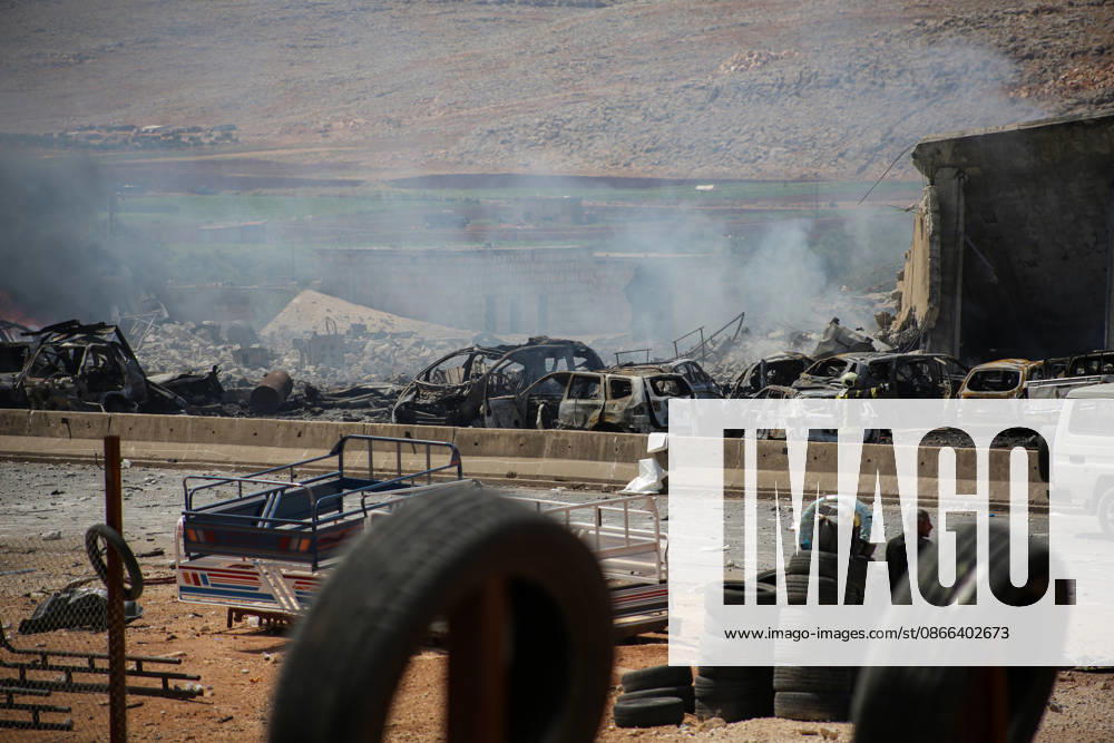 4 killed in explosion in Syria s Idlib province IDLIB, SYRIA - SEPTEMBER 09: Smoke rises after a powerful explosion, the cause of which has not yet been determined, at a warehouse where war remnant munitions were being collected near the Sarmada district of Idlib province in northwestern Syria on September 09, 2026. Police, ambulance, firefighting, and civil defense teams were dispatched to the area. Kasim Yusuf Anadolu Idlib Syria. Editorial use only. Please get in touch for any other usage.