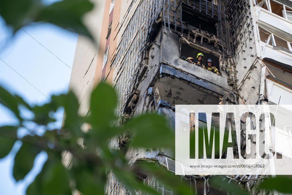State Emergency Service rescue workers look out from a window in a 24-storey apartment block damaged by a Russian attack in the Darnytskyi district of Kyiv, Ukraine, September 9, 2026. On Wednesday morning, September 9, a Russian drone hit the 24-storey building on the 12th floor. According to police, five people were injured, including a pregnant woman. (Photo by Danylo Antoniuk Ukrinform) Apartment block hit by Russian drone in Kyiv