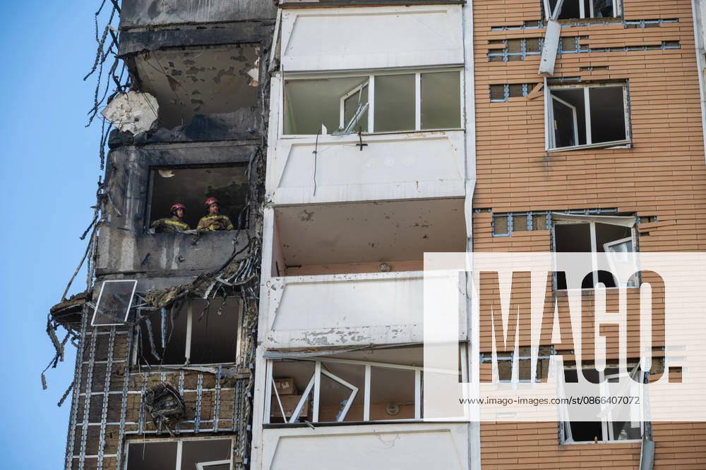 State Emergency Service rescue workers look out from a window in a 24-storey apartment block damaged by a Russian attack in the Darnytskyi district of Kyiv, Ukraine, September 9, 2026. On Wednesday morning, September 9, a Russian drone hit the 24-storey building on the 12th floor. According to police, five people were injured, including a pregnant woman. (Photo by Danylo Antoniuk Ukrinform) Apartment block hit by Russian drone in Kyiv